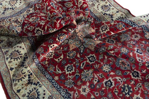 Surface texture of 1970s Isfahan rug with natural Cork and intricate pattern