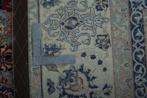 Backside of handmade 1970s Isfahan rug showing knot structure and weave density