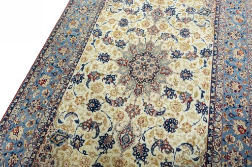 Backside of handmade 1950s Isfahan rug showing knot structure and weave density