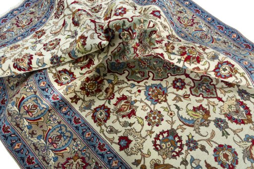Surface texture of 1950s Isfahan rug with natural Wool and intricate pattern
