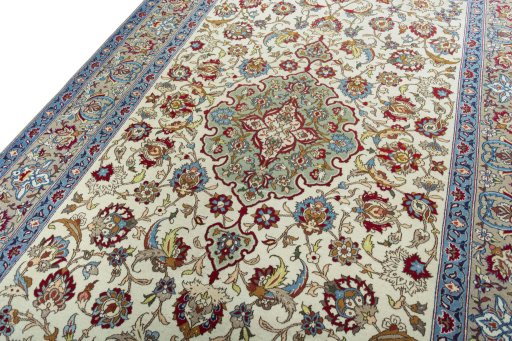 Backside of handmade 1950s Isfahan rug showing knot structure and weave density