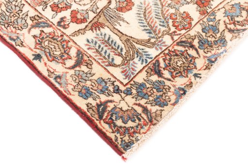 Backside of handmade 2002s Isfahan rug showing knot structure and weave density