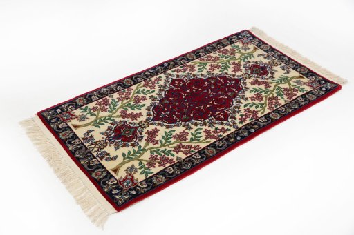 Corner detail of New Isfahan rug showing border pattern and Wool pile