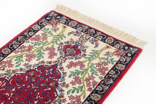 Surface texture of New Isfahan rug with natural Wool and intricate pattern