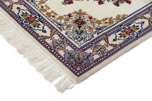 Backside of handmade New Isfahan rug showing knot structure and weave density