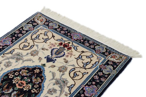 Surface texture of New Isfahan rug with natural Wool and intricate pattern