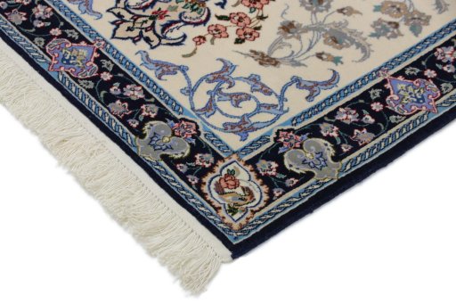 Backside of handmade New Isfahan rug showing knot structure and weave density
