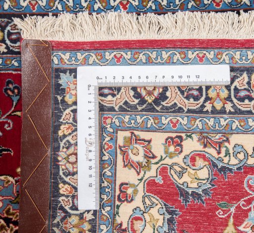 Corner detail of New Isfahan rug showing border pattern and Wool pile