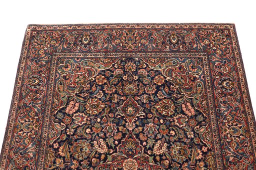 Surface texture of 1920s Kashan rug with natural Wool and intricate pattern
