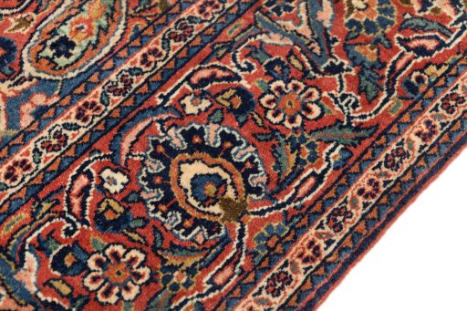 Central medallion detail of 1920s Kashan rug from Iran / Persia