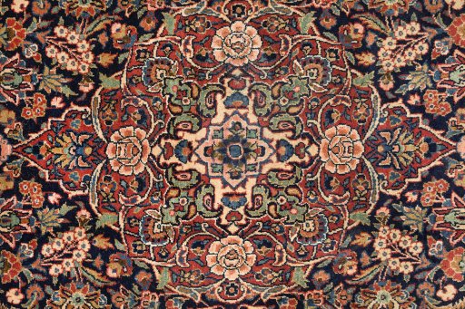 Close-up detail of 1920s Kashan rug from Iran / Persia showing Wool weave