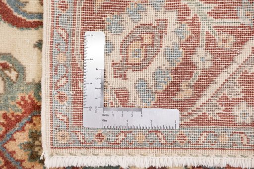 Close-up detail of 1990s Kashan rug from Iran / Persia showing Wool weave