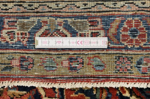 Corner detail of 1950s Kashan rug showing border pattern and Wool pile