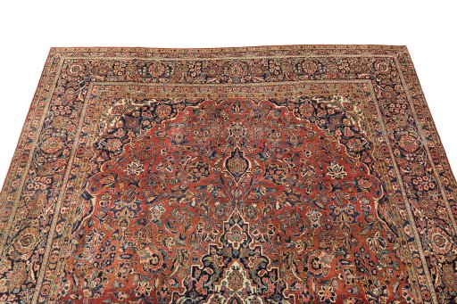 Backside of handmade 1950s Kashan rug showing knot structure and weave density