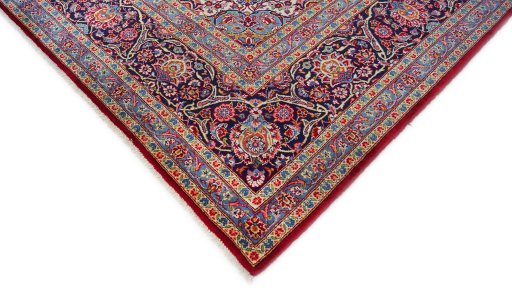 Backside of handmade New Kashan rug showing knot structure and weave density