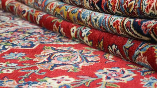 Full view of New Kashan rug from Iran / Persia, 438 × 325 cm in Red tones