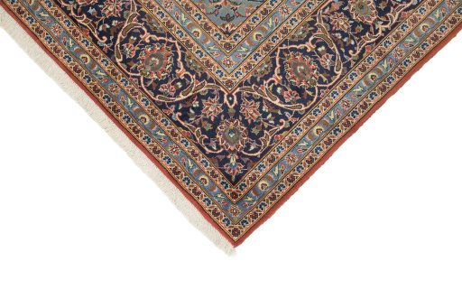 Backside of handmade 1990s Kashan rug showing knot structure and weave density