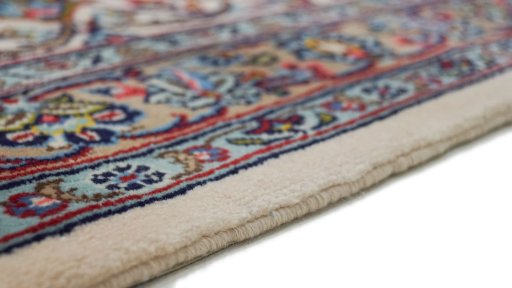 Close-up detail of 1980s Kashan rug from Iran / Persia showing Wool weave