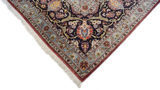 Corner detail of 1980s Kashan rug showing border pattern and Wool pile
