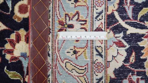 Central medallion detail of 1980s Kashan rug from Iran / Persia