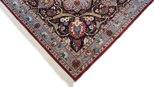 Backside of handmade 1980s Kashan rug showing knot structure and weave density