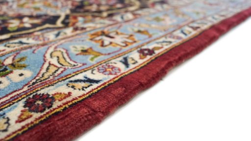 Close-up detail of 1980s Kashan rug from Iran / Persia showing Wool weave
