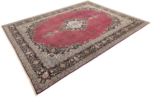 Corner detail of 1980s Kashan rug showing border pattern and Wool pile