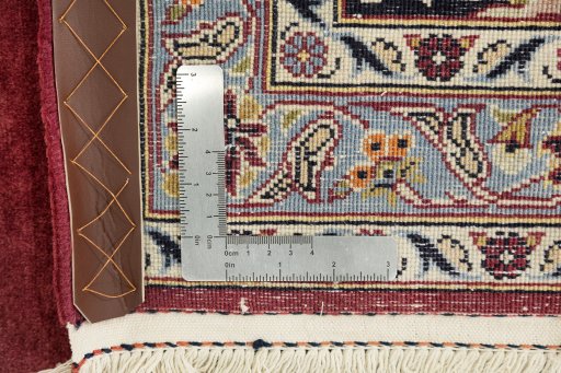 Close-up detail of 1980s Kashan rug from Iran / Persia showing Wool weave