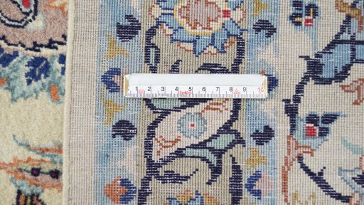 Corner detail of 1970s Kashan rug showing border pattern and Wool pile