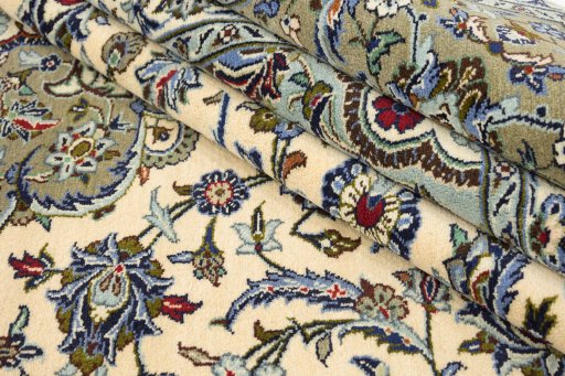 Corner detail of 1990s Kashan rug showing border pattern and Wool pile