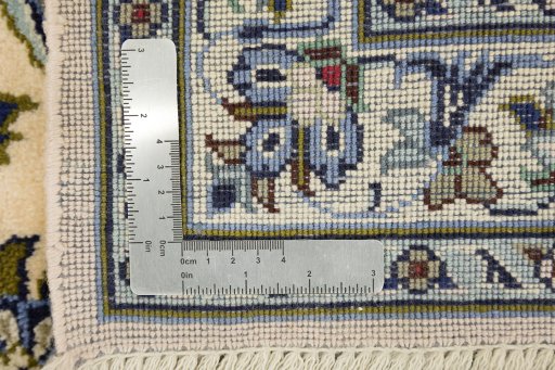 Close-up detail of 1990s Kashan rug from Iran / Persia showing Wool weave