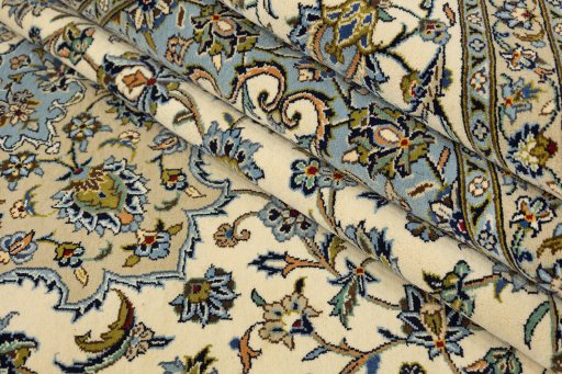 Corner detail of 1990s Kashan rug showing border pattern and Wool pile