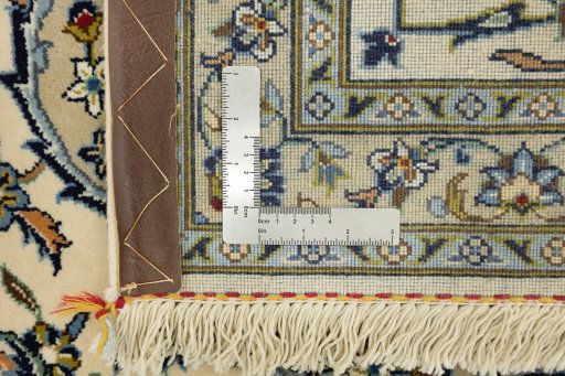 Close-up detail of 1990s Kashan rug from Iran / Persia showing Wool weave