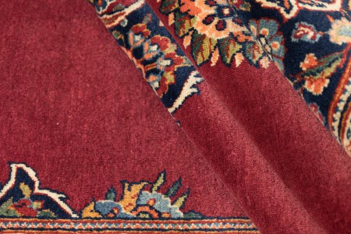 Corner detail of 1940s Kashan rug showing border pattern and Wool pile