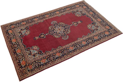 Close-up detail of 1940s Kashan rug from Iran / Persia showing Wool weave