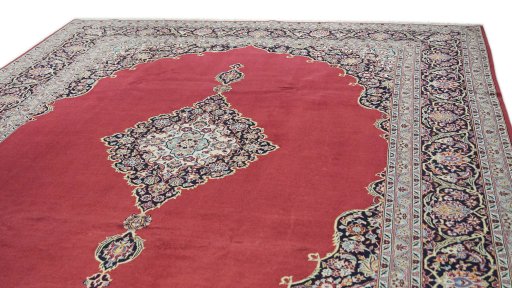 Surface texture of 1990s Kashan rug with natural Wool and intricate pattern