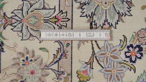 Corner detail of 1990s Kashan rug showing border pattern and Silk pile