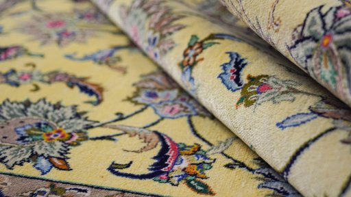 Close-up detail of 1990s Kashan rug from Iran / Persia showing Silk weave