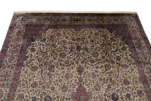 Backside of handmade 1900s Kashan rug showing knot structure and weave density