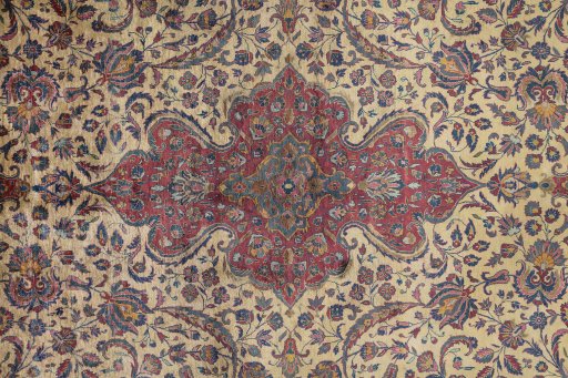 Central medallion detail of 1900s Kashan rug from Iran / Persia