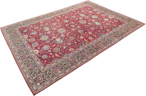 Corner detail of 1950s Kashan rug showing border pattern and Wool pile