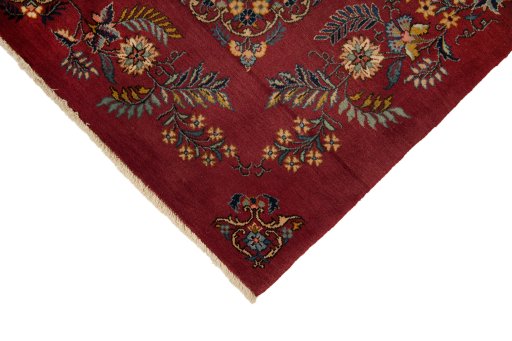 Backside of handmade 1950s Kashan rug showing knot structure and weave density