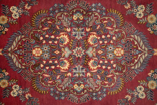 Central medallion detail of 1950s Kashan rug from Iran / Persia