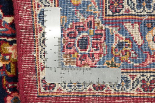 Close-up detail of 1950s Kashan rug from Iran / Persia showing Wool weave