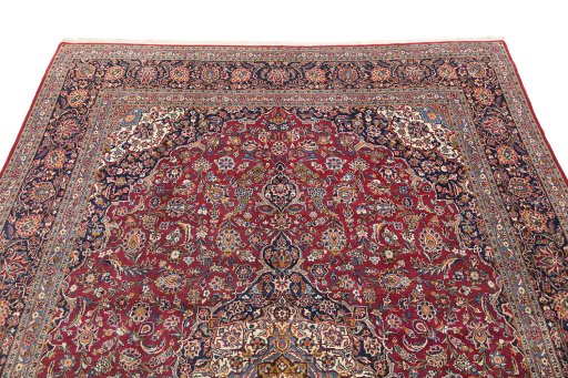 Surface texture of 1950s Kashan rug with natural Wool and intricate pattern