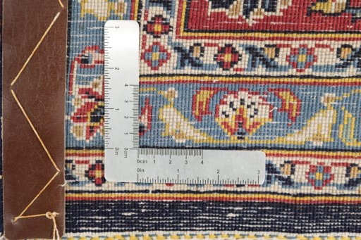 Close-up detail of New Kashan rug from Iran / Persia showing Wool weave