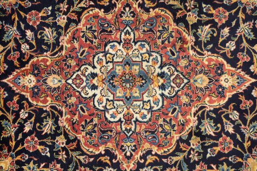Central medallion detail of New Kashan rug from Iran / Persia