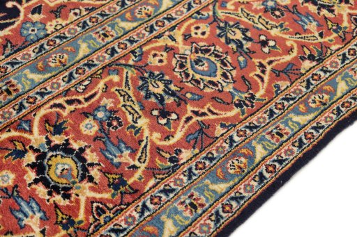 Close-up detail of New Kashan rug from Iran / Persia showing Wool weave