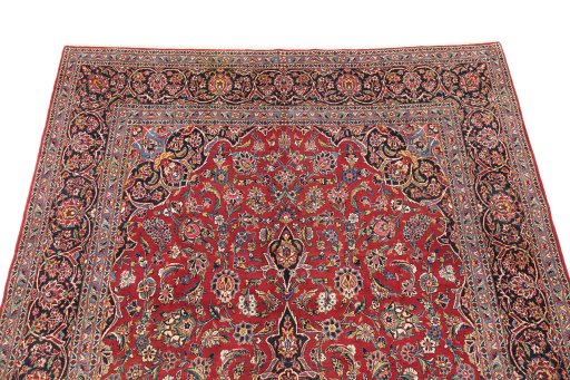 Surface texture of 1950s Kashan rug with natural Wool and intricate pattern