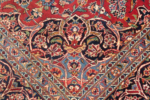Full view of 1950s Kashan rug from Iran / Persia, 363 × 229 cm in Dark red tones